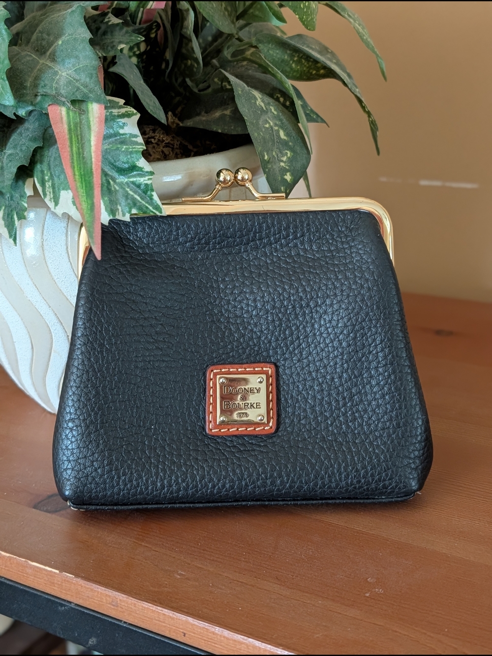 Dooney & Bourke Black Pebbled Leather Kiss‑Lock Coin Purse with Gold Trim